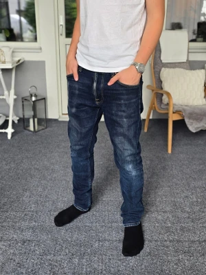 Nudie jeans - Snygga Nudie Jeans med coola fades. Storlek W32/L32. Modell Lean Dean. Skriv om du har några frågor 😄