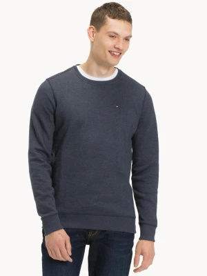 Mörkblå sweatshirt från Tommy Hilfiger Barntröja - Mörkblå sweatshirt från Tommy Hilfiger med rund halsringning och diskret logga på bröstet. Tröjan har långa ärmar och ribbade muddar vid ärmslut och nederkant. Perfekt för en avslappnad och stilren look.
