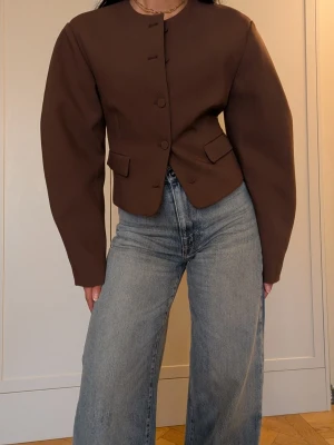 Zara cropped blazer - Zara cropped sculptural blazer in chocolate brown, only used a couple of times, beautiful piece. Size XS/34