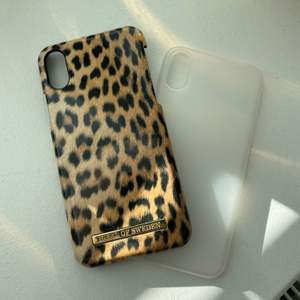 Ett leopard från iDeal of Sweden och ett vanligt genomskinligt skal till iPhone X. Använda men gott skick! Båda två för 130kr inkl frakt.