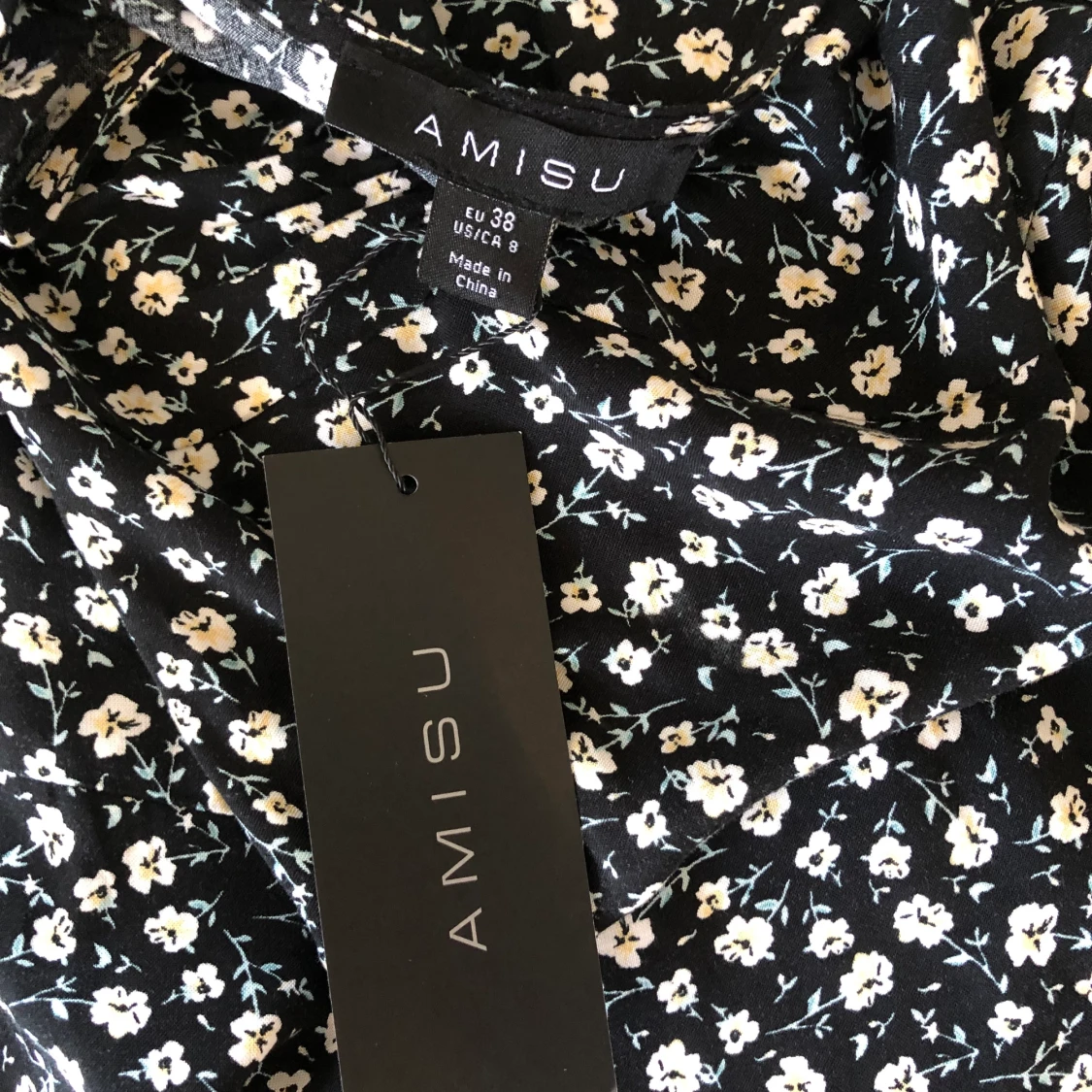 Blommig klänning strl 38 - 90