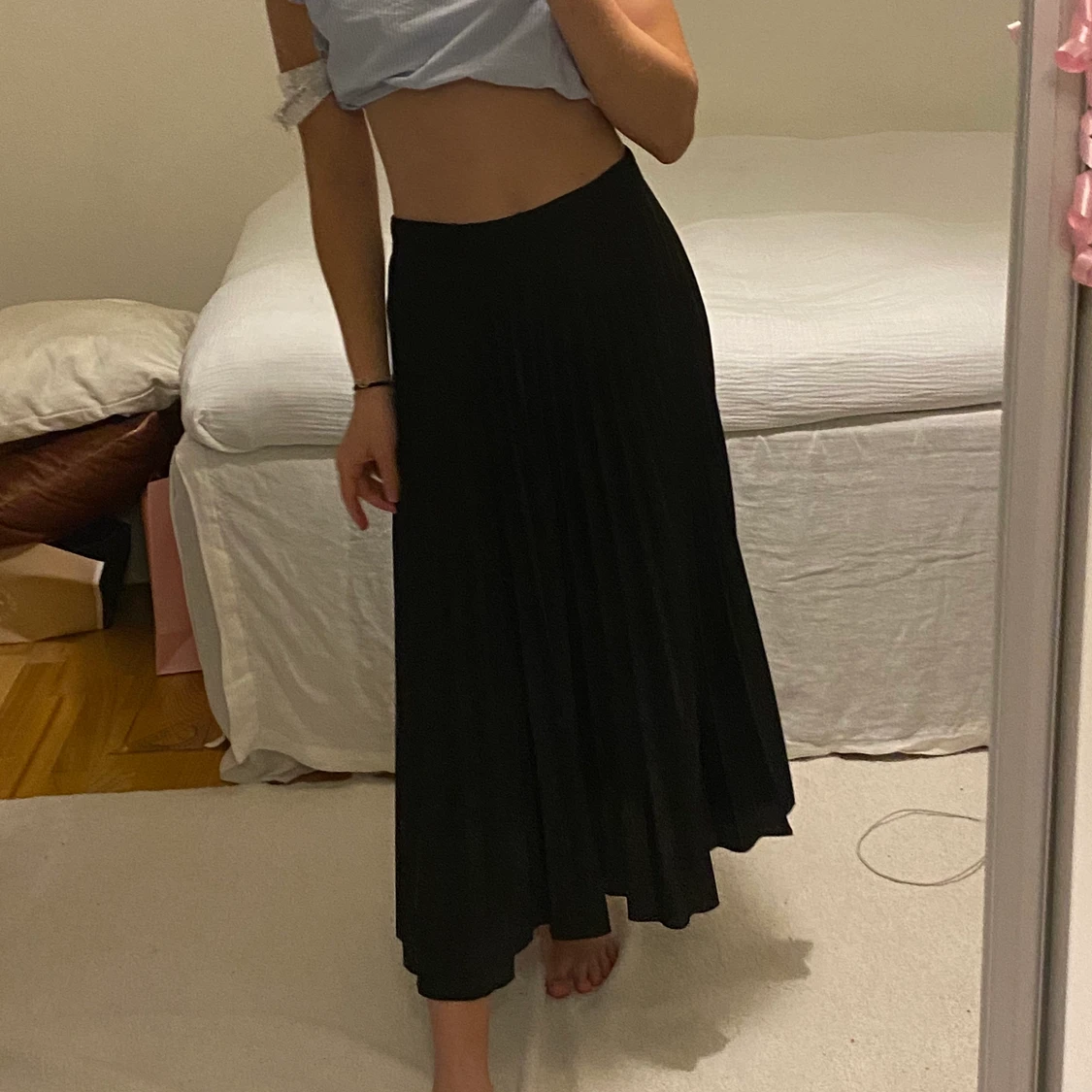 Svart plisserad långkjol - 90