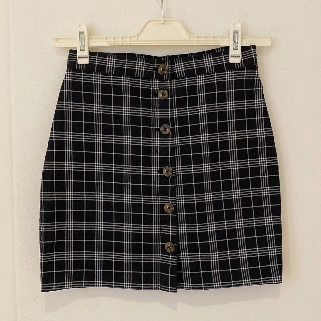 Rutig kjol med knappar