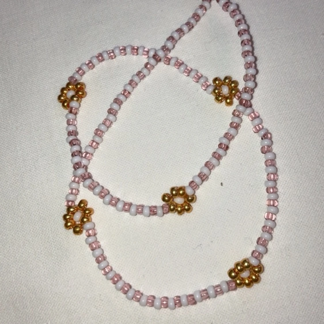 Halsband blommor - 91