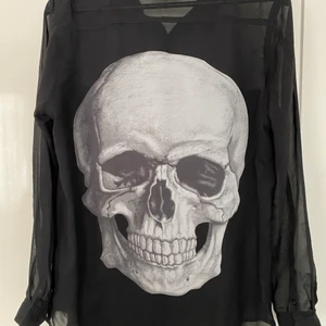 Blus  - Blus med skall print 