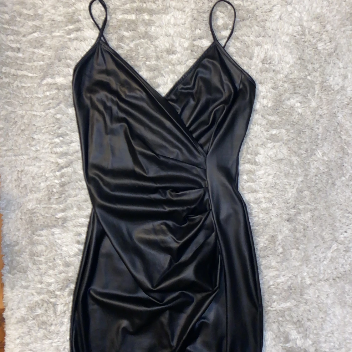 Läderklänning i svart strl S - 90