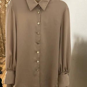  river island  - Har köpt den för 6 månader sedan, haft den två gånger på mig, och den som en ny