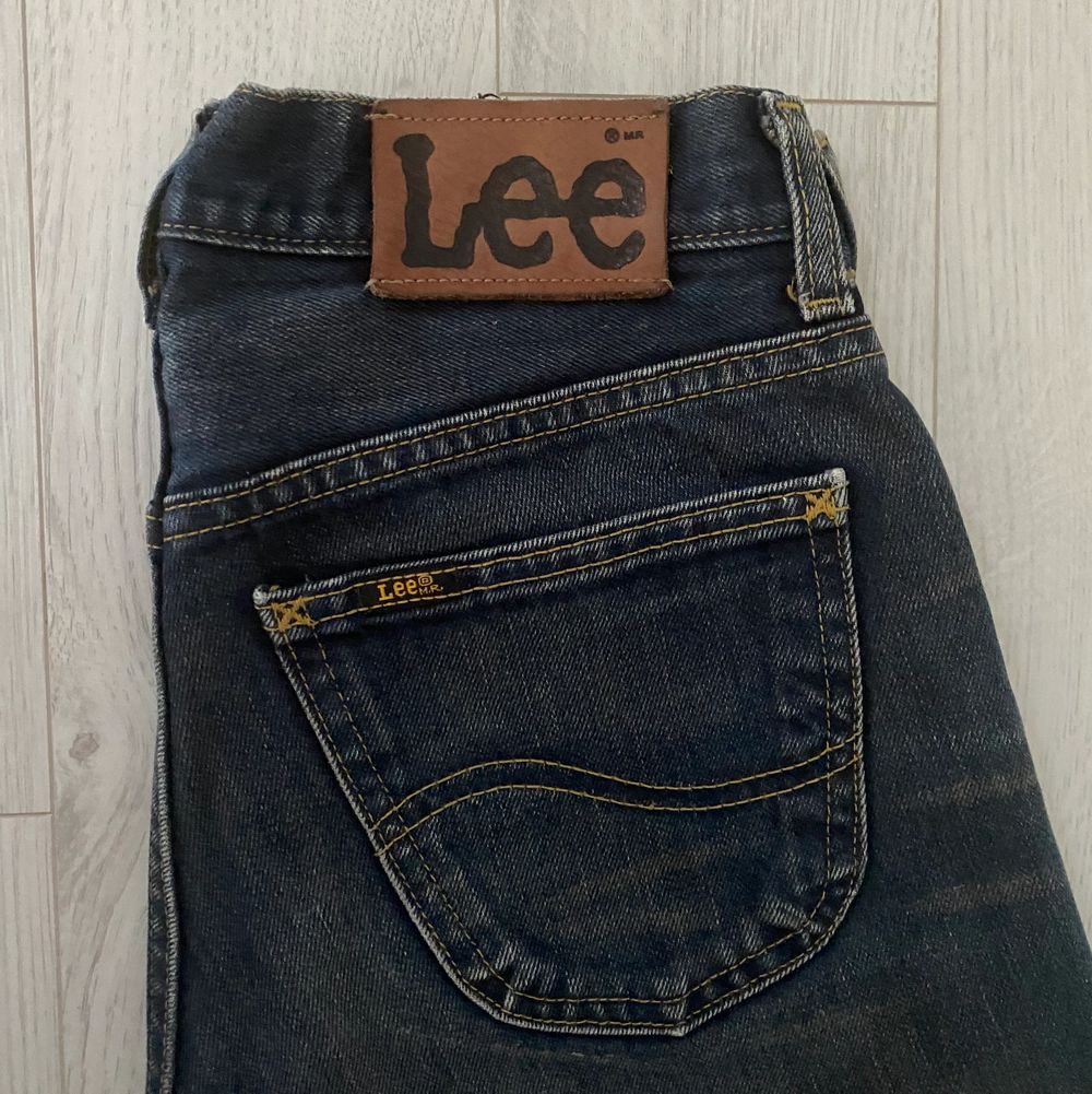 Lee mörka bootcut-jeans | Plick Second Hand