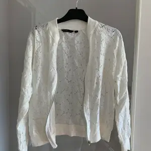 Blommig kofta från mywear. Använd mycket lite. S men liten  i storleken