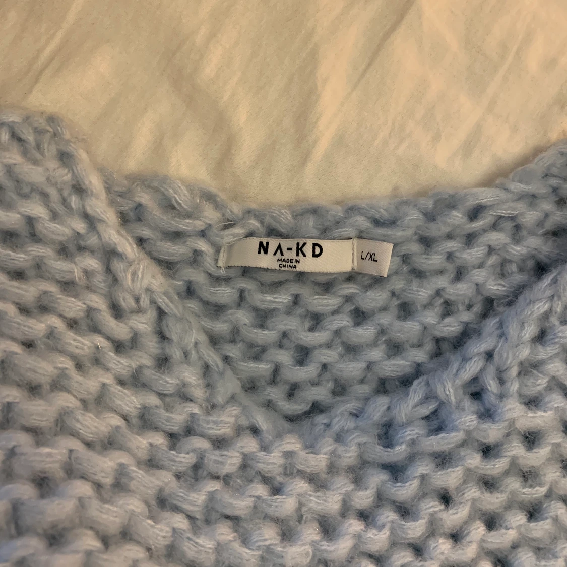 Tjockt stickad, babyblå, st L/XL - 91