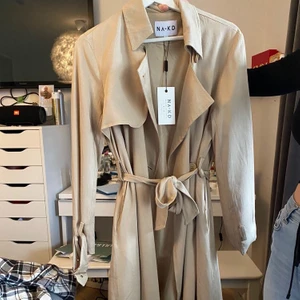 Nakd kappa strl S - Aldrig använd prislapp kvar. Köpt för ca 800 kr. Jättefin, säljer pågrund av för stor storlek. Pris kan diskuteras🥰