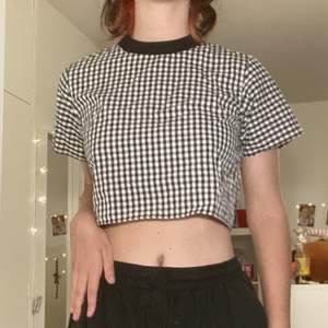 The checkered T-shirt in perfect condition will be additionally washed and ironed before sale;)