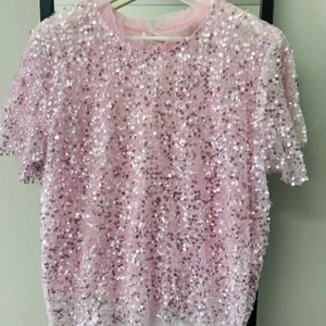 Beautiful party top - Baby pink color beautiful party top which is hardly wear. Brand name: noir, size M. Going to sell because it's not fit my size