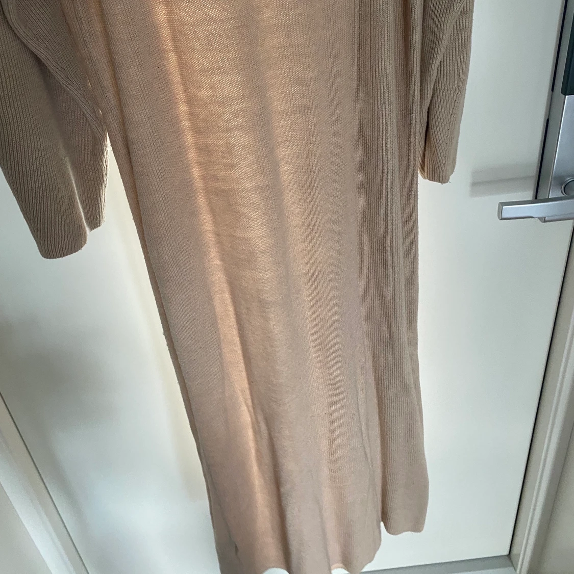 Ribbstickad klänning - 90