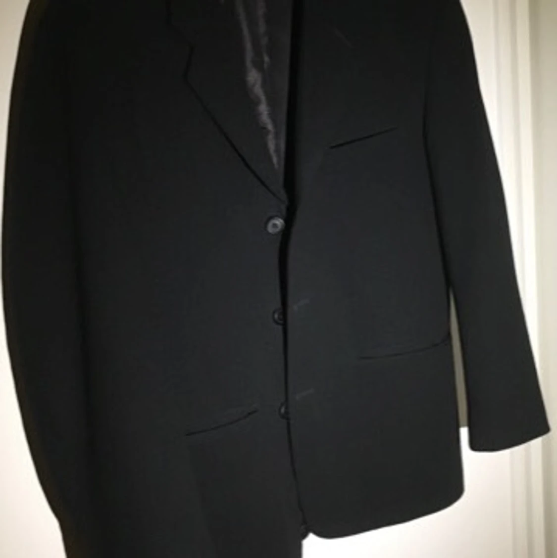 Svart kavaj från tidigt 2000