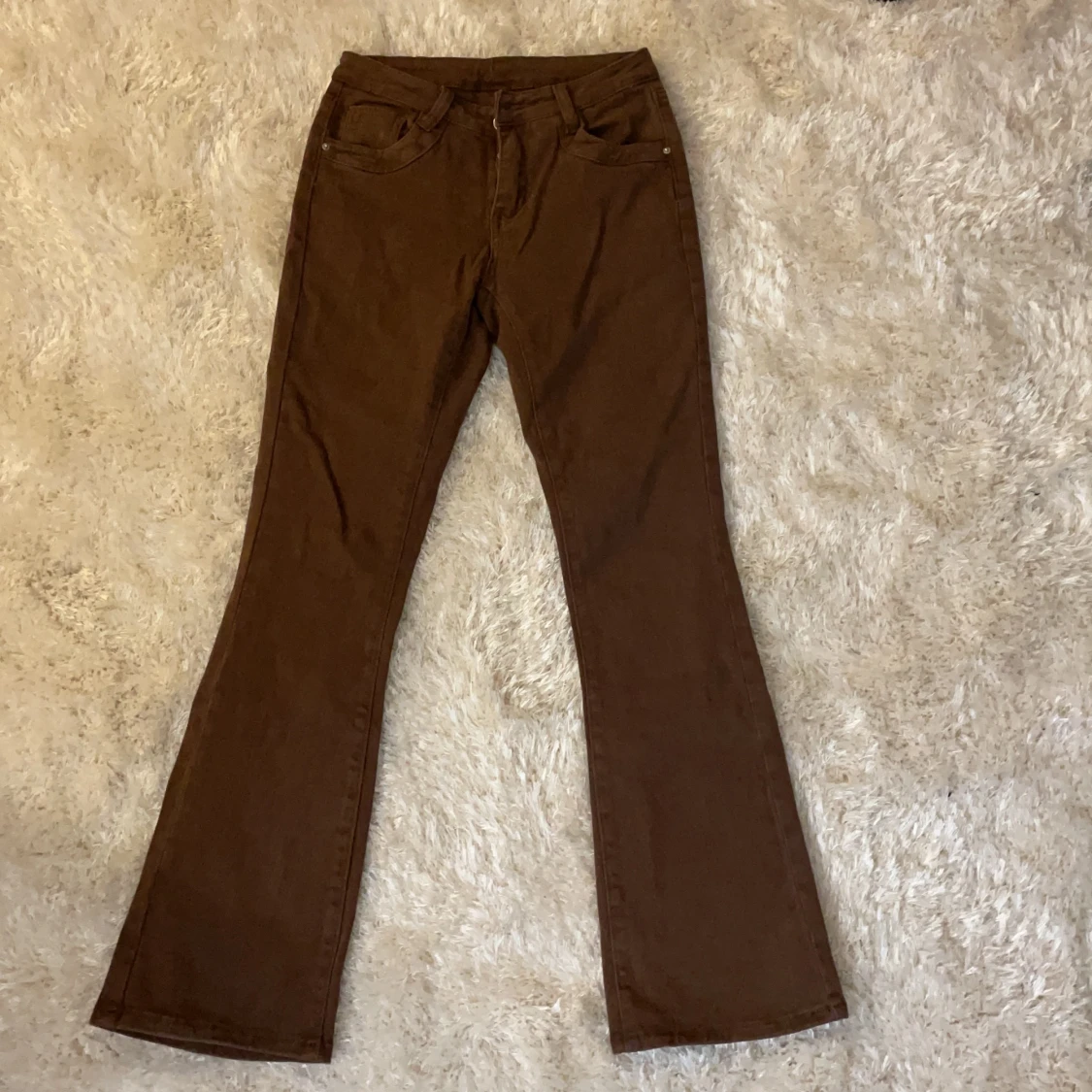 Lågmidjade bruna jeans