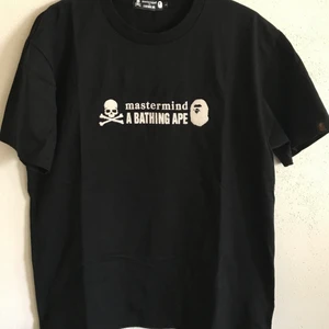 Bape x Mastermind Japan Jewel Logo Tee - Bape / A Bathing Ape x Mastermind Japan Sparkling Jewel Logo T-Shirt  Size large, fits true to size men’s large. Great condition, no flaws or damage.  DM if you need exact size measurements.   Buyer pays for all shipping costs. All items sent with tracking number.   No swaps, no trades, no offers.  