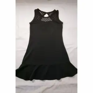 Fin kort svart klänning i storlek S/M