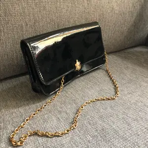 Universal Black elegant bag with cute golden turtle will be perfect addition to your wordrobe!