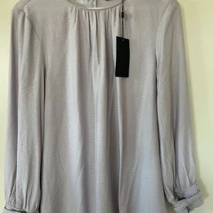 Stockholm LM blus - Ny fin blus endast prövad. Lappen finns kvar. 