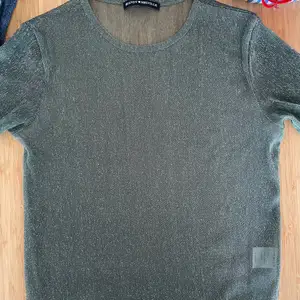 Brandy Melville sheer green top. In perfect condition. Size S