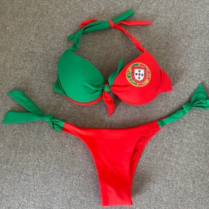 Bikini NY Portugal flaggan - Aldrig använt bikini set köpt i Portugal i stl 38/XS. Skulle säga S. Push up inläggen går enkelt att ta ut och sätta tillbaks. Fin underdel med lite mindre tyg/mer visande. Superfint. Finns i Malmö eller frakt 44kr. 