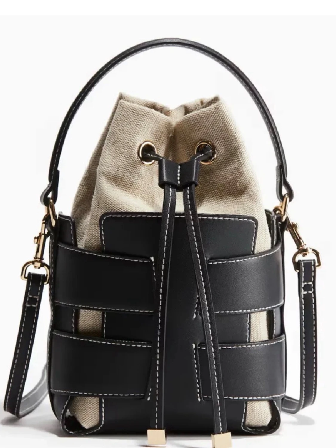 Svart och beige bucket bag