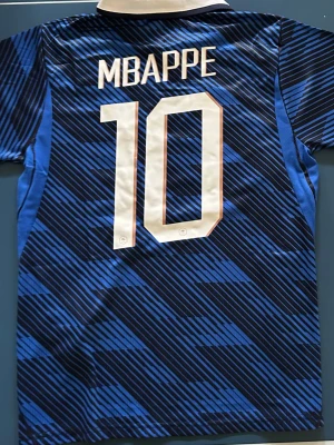 Mbappé Frankrike Fotbollströja - Ny Kylian Mbappé Frankrike Fotbollströja inför vm 2026