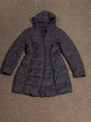 Dark Blue jacket  - Its has a small hole on the front side.                100% polyester.    Size M.  