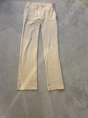 Beige mjukisbyxor Juicy Couture XS - Saknar en metall sak