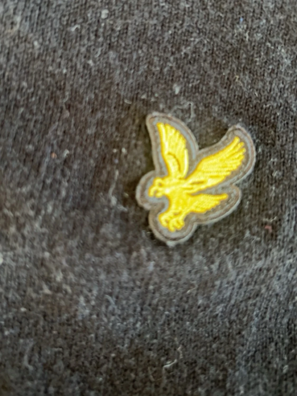 Mörkblå stickad tröja från Lyle & Scott - 1