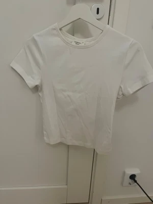 Vit magtopp  - Väldigt fin topp passar med allt