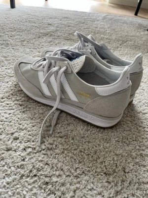 Adidas SL72 - Adidas skor, använda 2 ggr. Säljes pga att jag inte gillar dem. Nyskick!