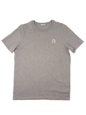 Moncler Logo T-Shirt - Information about the product: Made of 100% Cotton.   Condition: This T-shirt is in very good condition. Almost like new with minimal signs of use. 