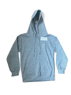Grå hoodie - Säljer en helt ny grå hoodie med prislapp på. 