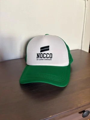 Nocco keps - Säljer en ny och välbehållen Nocco truckerkeps!