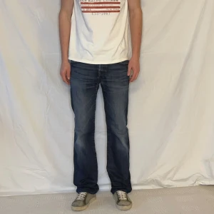 Blå Jeans från 7 for all Mankind - Storlek 34. 