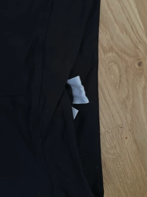 Svarta bootcut leggings från gina  - Ett par svarta träningsbyxor med flare från gina tricot