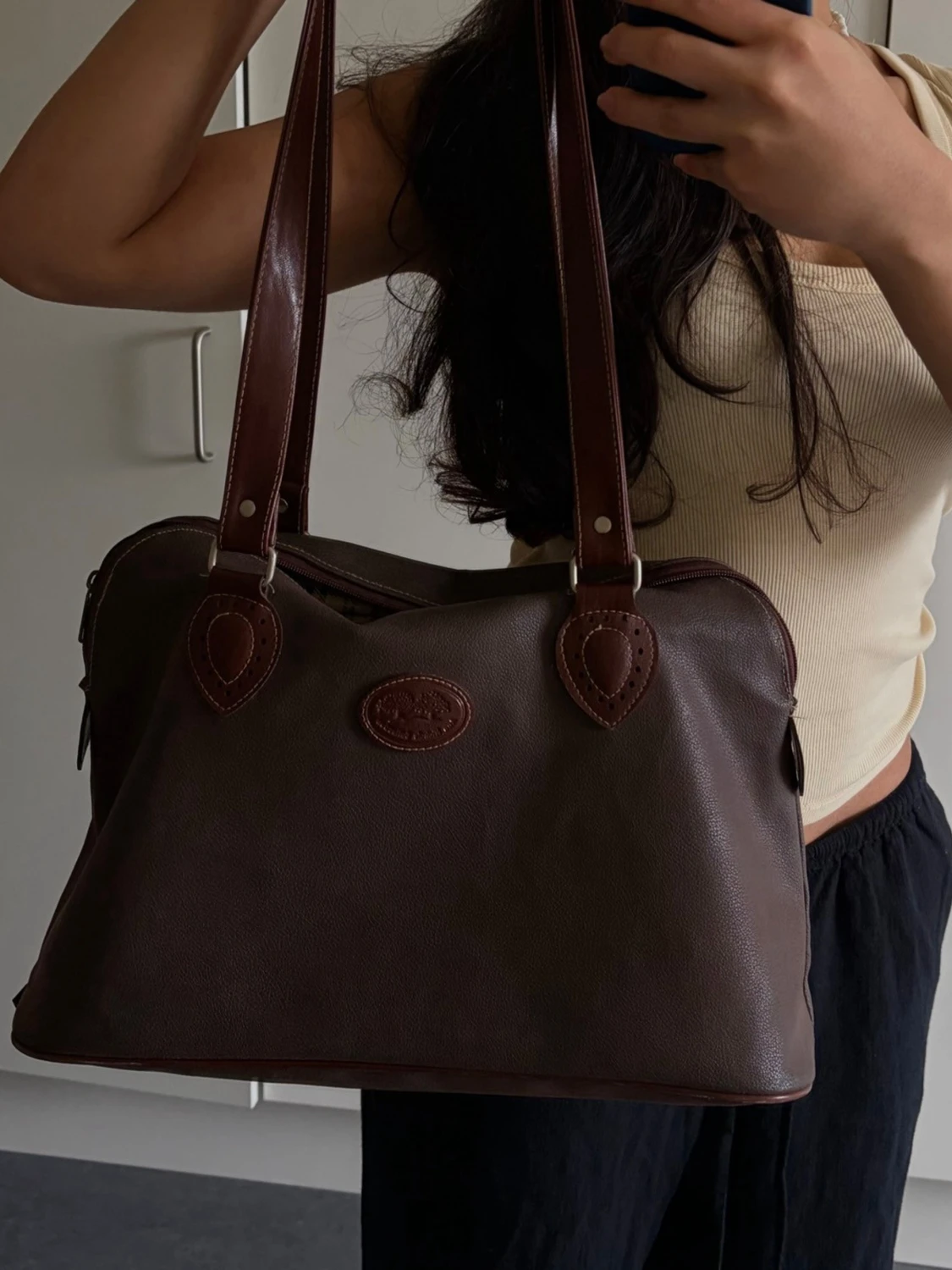 Mörkbrun läderhandväska från The Bridge