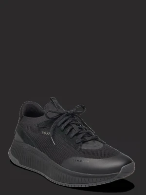 Svarta sneakers från BOSS - Sneakers från BOSS som är köpta för 2499kr och är använda max 3-4 gånger så dem är som nya. Storlek:41. Är väldigt öppen för prisförslag