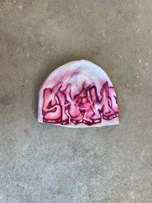 Airbrushed patchwork beanie - Sewn by us from old fabric scraps and airbrushed by Shamo
