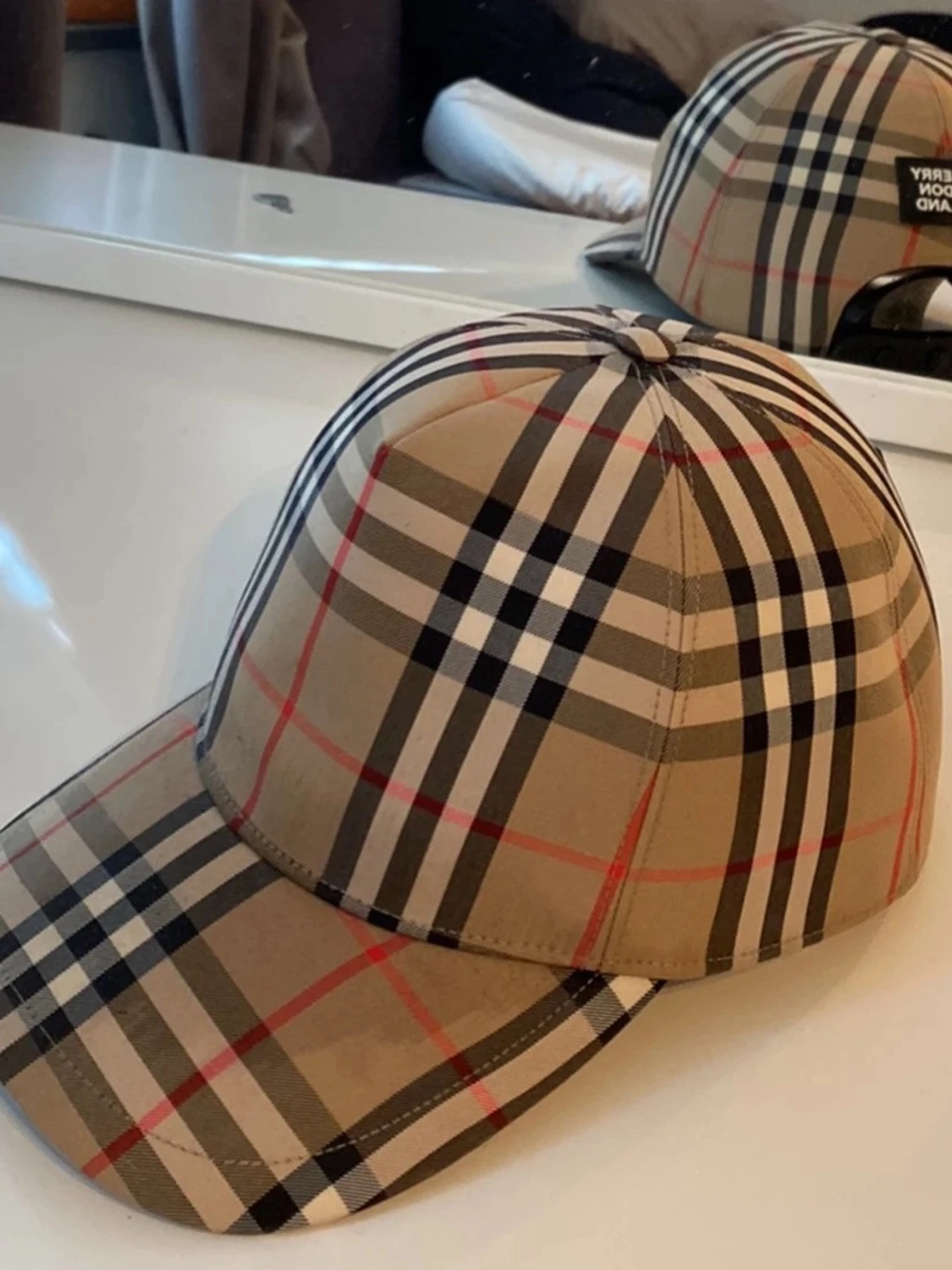 Beige rutig keps från Burberry