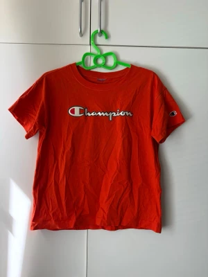 Orange Champion t-shirt - Inga skador