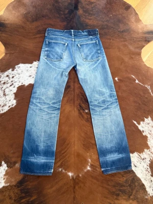 Vintage Selvage Denime jeans - Tjena! Säljer dessa otroliga Selvage Denime jeans, jeansen är i fint skick men lite små skador, passar som W32/L34, hör av dig vid funderingar och fler bilder på skadorna!🙌