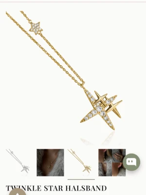 Guldigt halsband med stjärnhänge - Supersnyggt halsband från ioaku guldton med ett stort gnistrande stjärnhänge täckt av små stenar och en mindre stjärndetalj på kedjan. Den är från adventskalendern förra året
