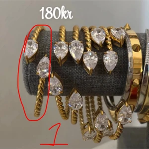 Guldfärgat armband med droppformade stenar - 1 armband 