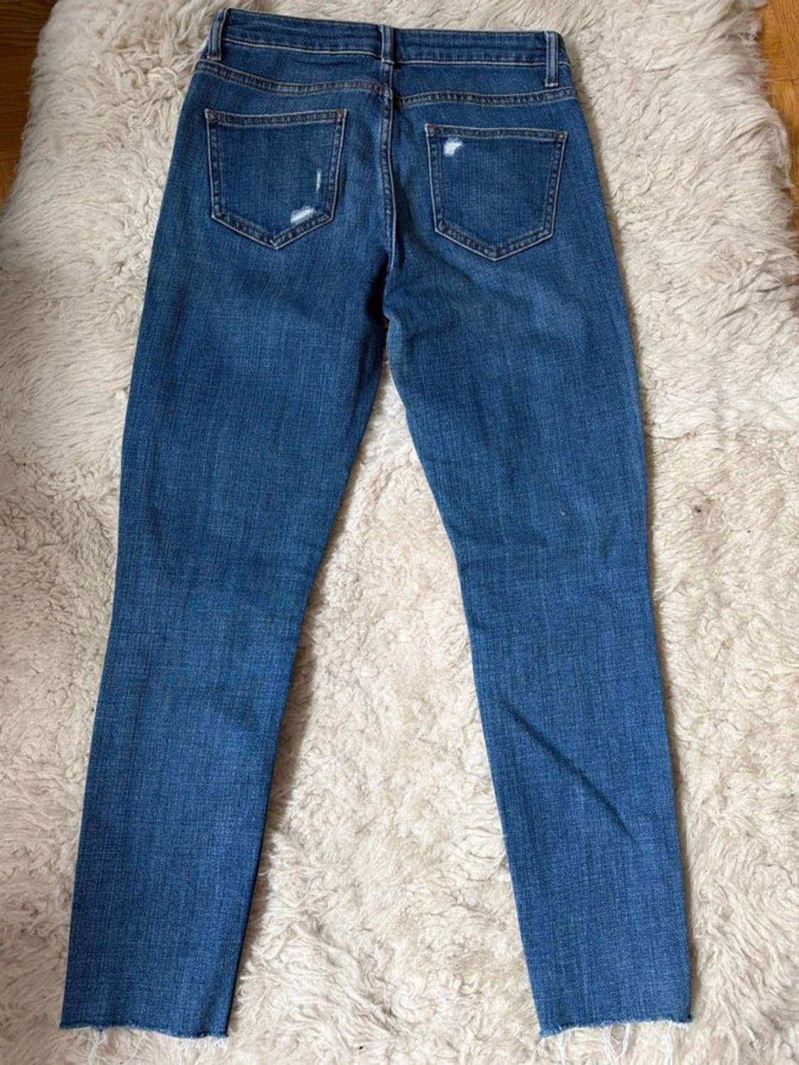 Blå slitna skinny jeans med hål - 1