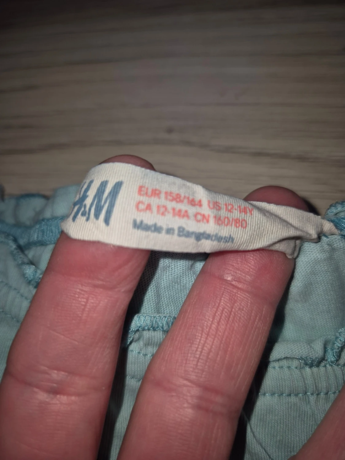 Ljusblå topp med volangkant - 2