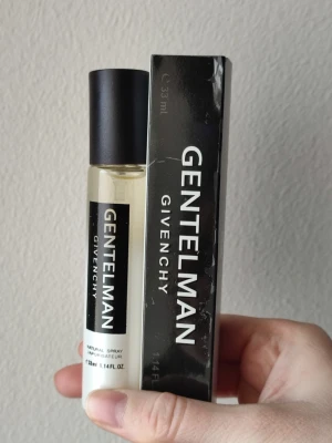 Givenchy Gentleman - Givenchy Gentleman Perfume. 33ml bottle. New! Has some flaws on the front of the box that you can see in the pictures.