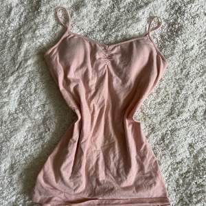Vintage linne i en rosa färg med inbyggd vaddering 